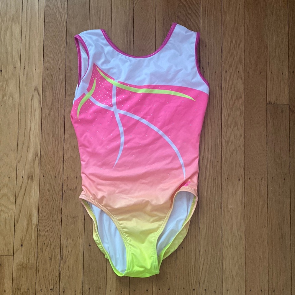 very cute and vibrant gymnastics leotard!! size adult extra small!!